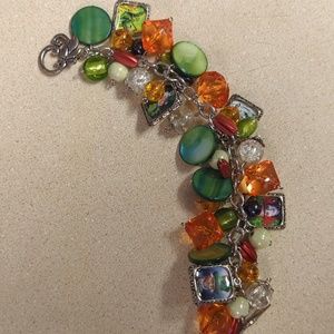 Mad Hatter Disney charm bracelet in green & orange costume jewelry